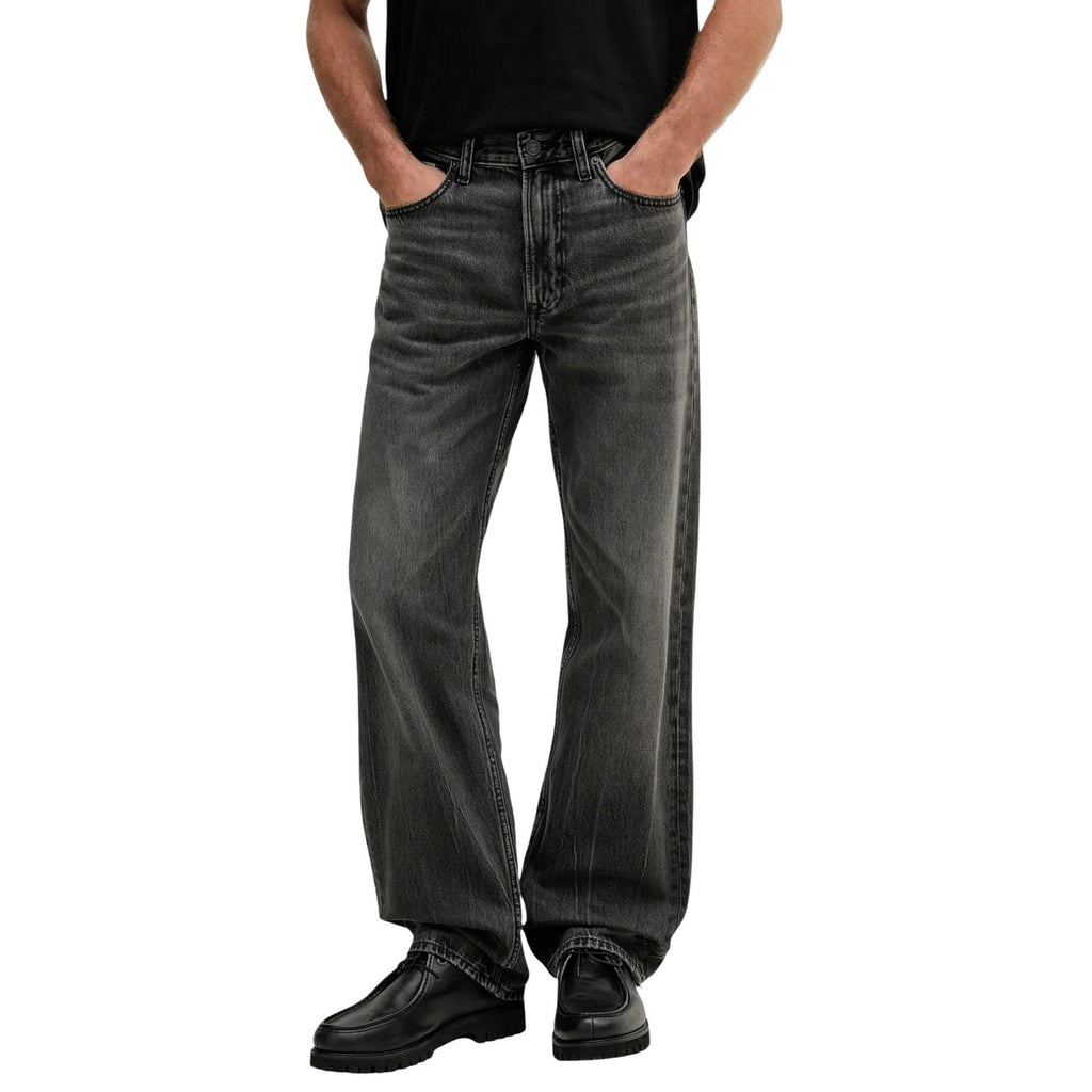 Front view of the black jeans featuring a straight leg and five pockets on a white background.