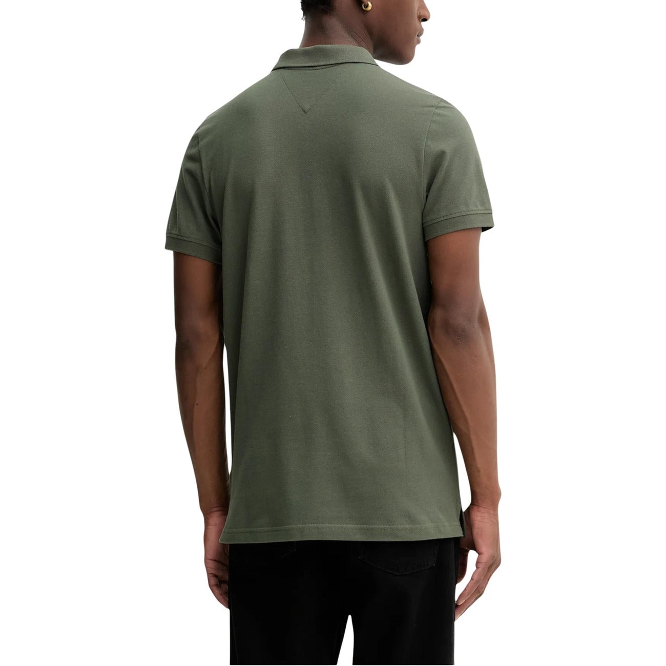 Back view of the green polo shirt showcasing short sleeves and a classic collar.