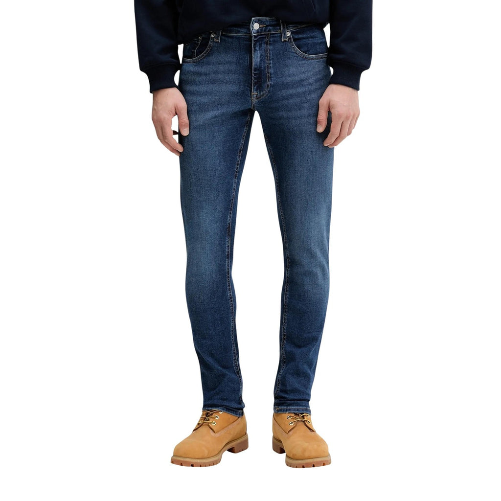 Front view of blue skinny fit jeans featuring five pockets and belt loops on a white background.