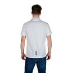 Back view of the white polo shirt showcasing the collar and short sleeves.