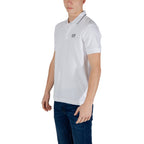 Side view of the white polo shirt highlighting the collar and short sleeves.