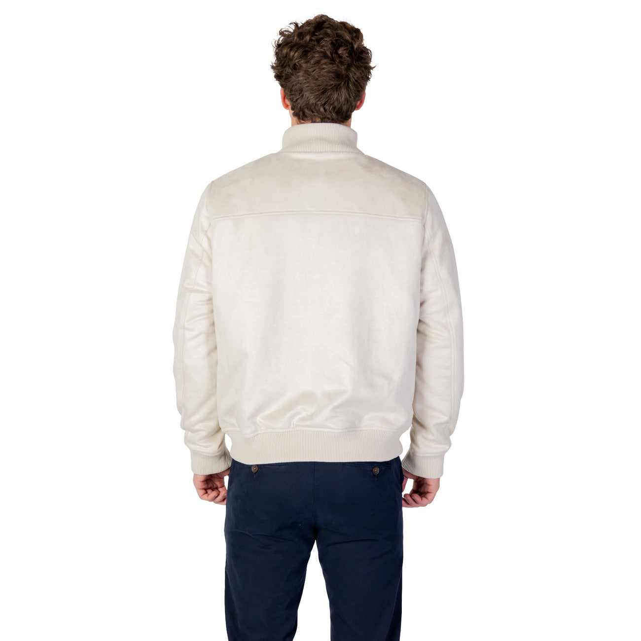 Lifestyle shot of the light beige blazer showcasing button closure and quilted design.