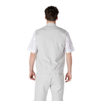 Lifestyle shot of the light gray vest with zipper closure and collarless design, set against a white background.